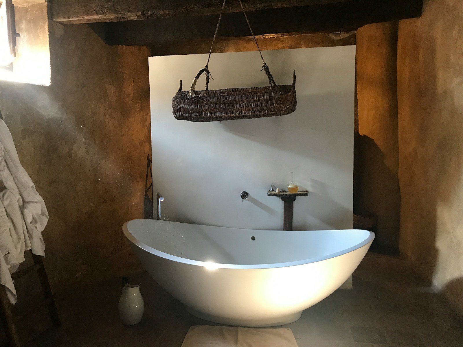 Photo by Gerardo Lamattina a bathtub in a bathroom